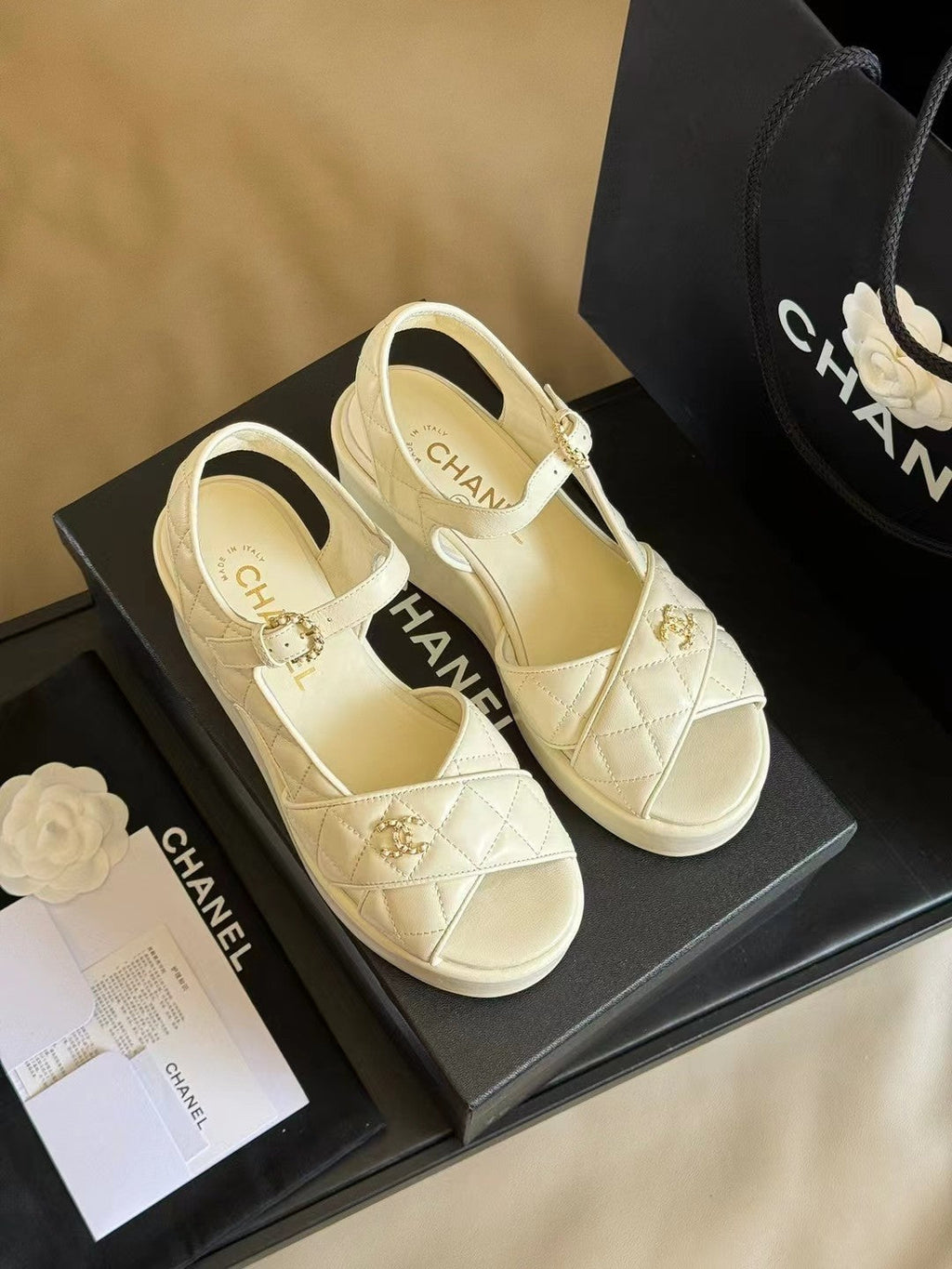 CHANEL CLASSIC WEDGE SANDALS IN WHITE LAMBSKIN