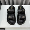 CHANEL dad sandals black lambskin mules